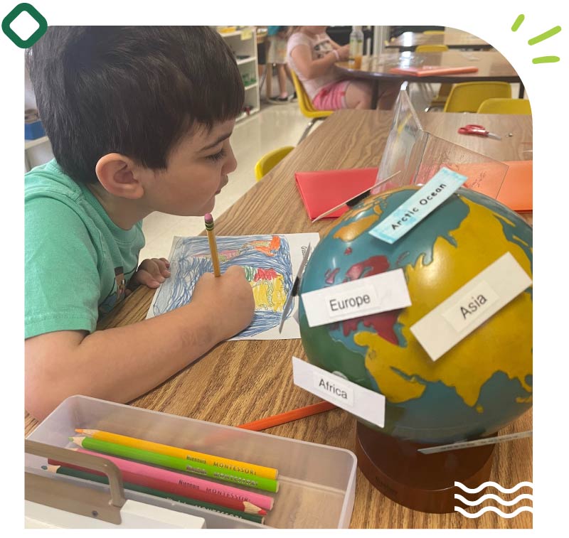 a young child focuses on a practical life activity 